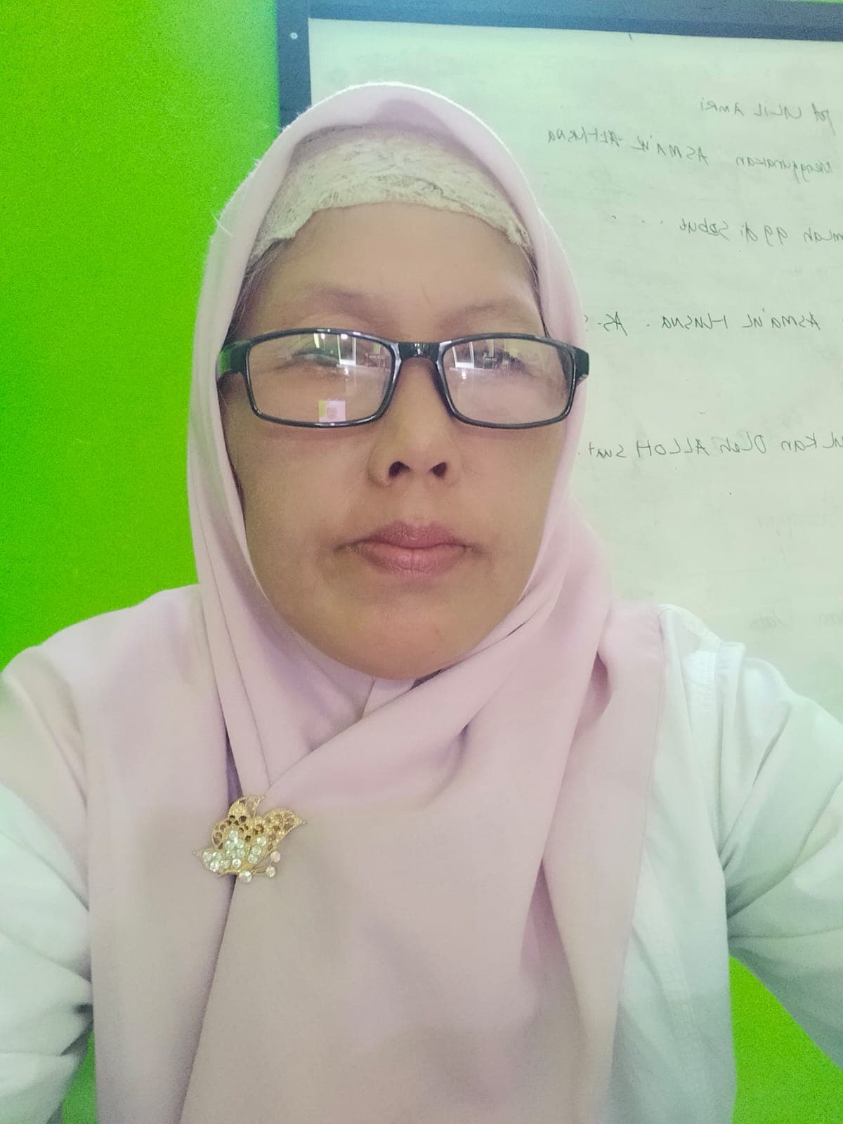 Potret Binti Rohmah, S.Ag — Guru BTQ