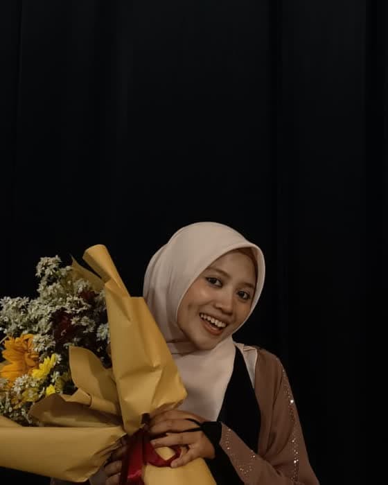 Potret Ustadzah Izzatul Adliatisy Syahidah — Pembimbing